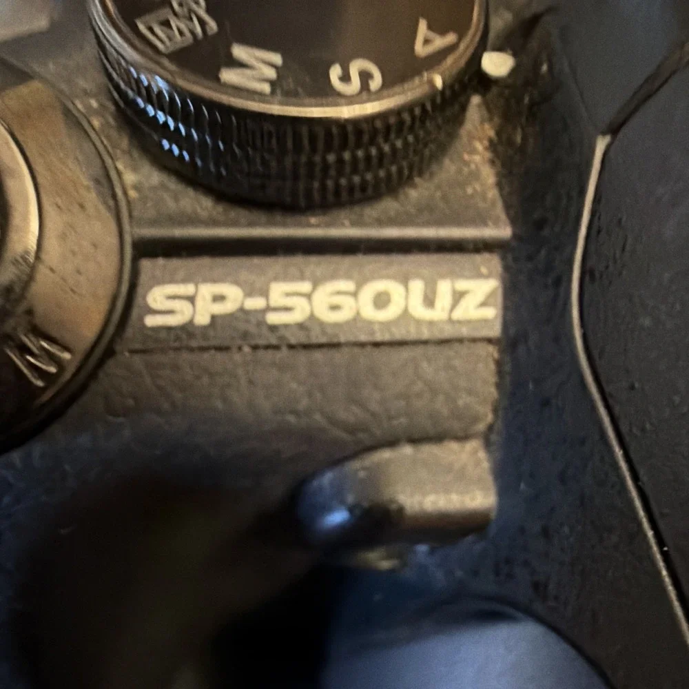 Olympus SP-560UZ 8MP Bridge Camera 18x Optical Zoom Viewfinder Flash Black